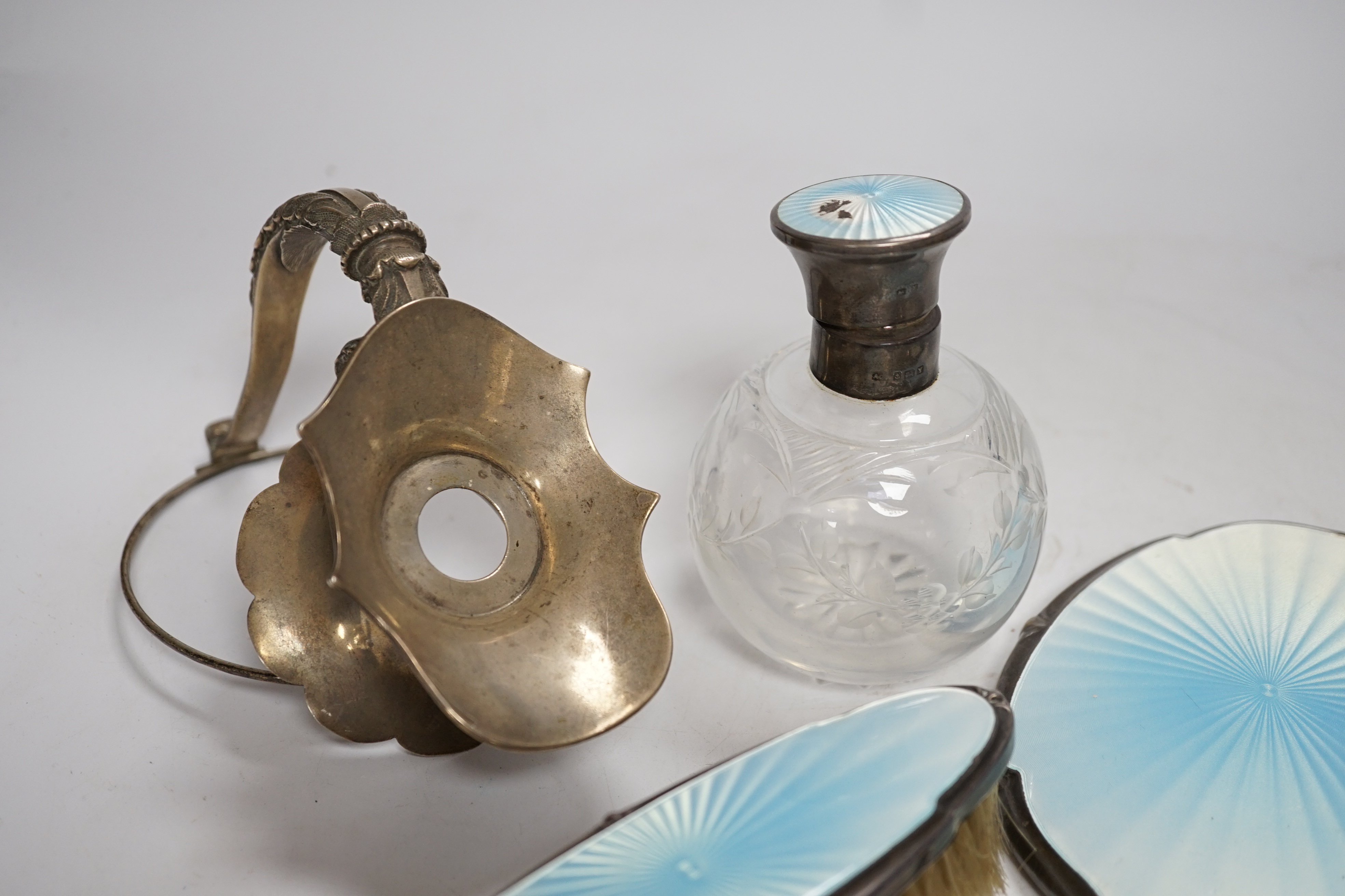 A George V silver claret jug mount, Walker & Hall, Sheffield, 1912, three silver and enamel dressing table items including a hand mirror and a cased set of six silver bean end coffee spoons.